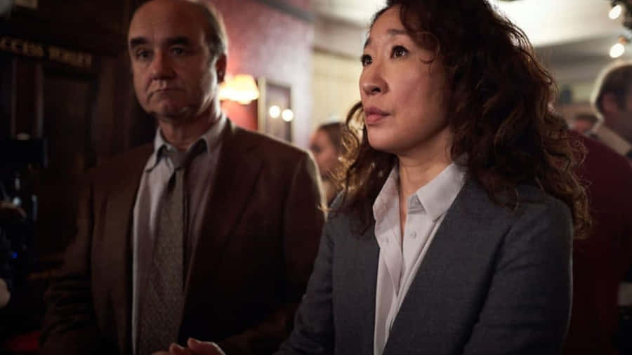 Killing Eve Charactersin Tense Scene Wallpaper