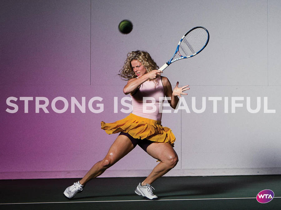 Kim Clijsters Demonstrating Strength On The Tennis Court Wallpaper