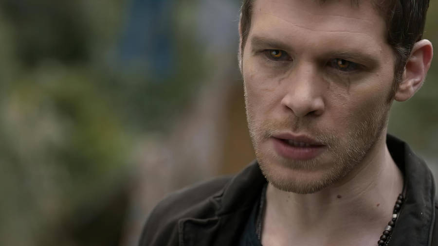 Klaus Mikaelson With Veiny Glowing Eyes Wallpaper