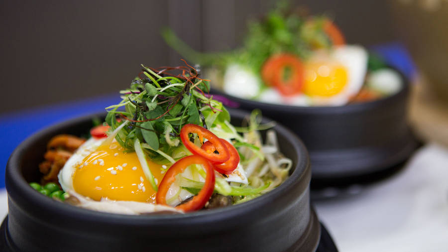 Korean Bibimbap With Peppers And Greens Wallpaper