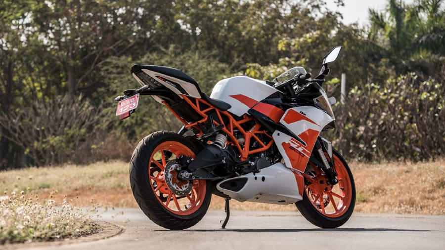 Ktm Rc 200 On Deserted Road Wallpaper