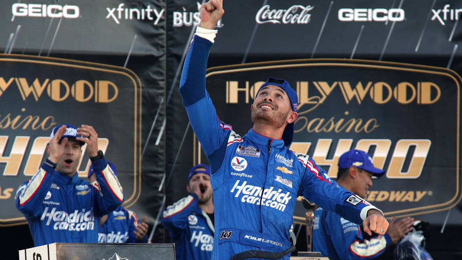 Kyle Larson Pointing To The Sky Wallpaper