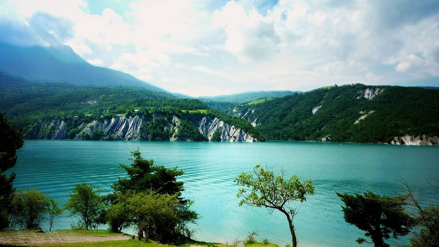 Lake View With Turquoise Water Wallpaper