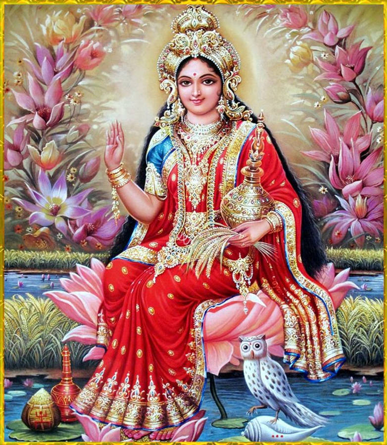 Lakshmi Devi With Flowers Wallpaper