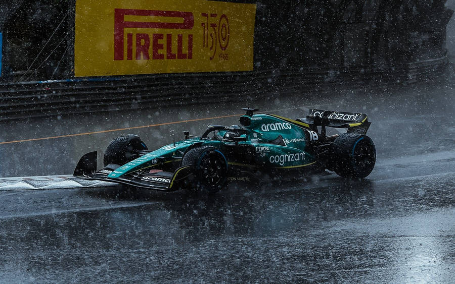 Lance Stroll Car Under The Rain Wallpaper