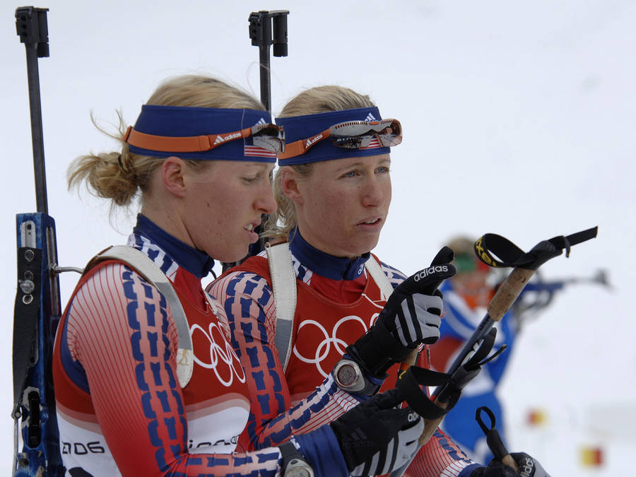 Lanny And Tracy Barnes Competing In Winter Olympics Biathlon Wallpaper