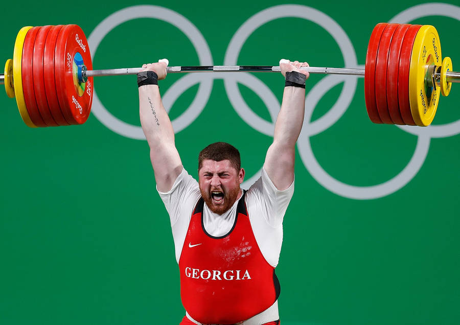 Lasha Talakhadze Weight Lifting At Olympics Wallpaper