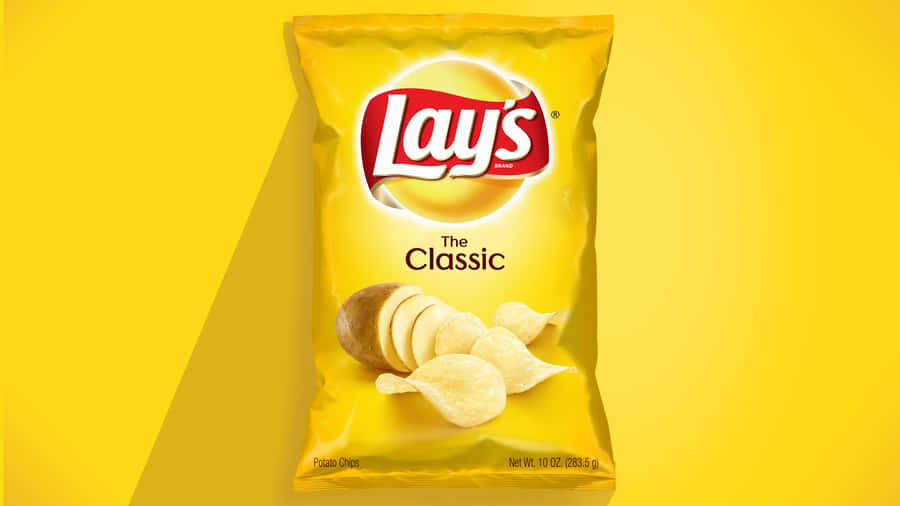 Lays Potato Chips In Yellow Background Wallpaper