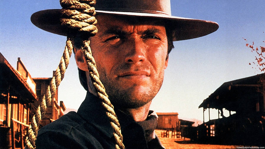 Legendary Clint Eastwood In A Pensive Mood In 'the Good, The Bad And The Ugly' Wallpaper