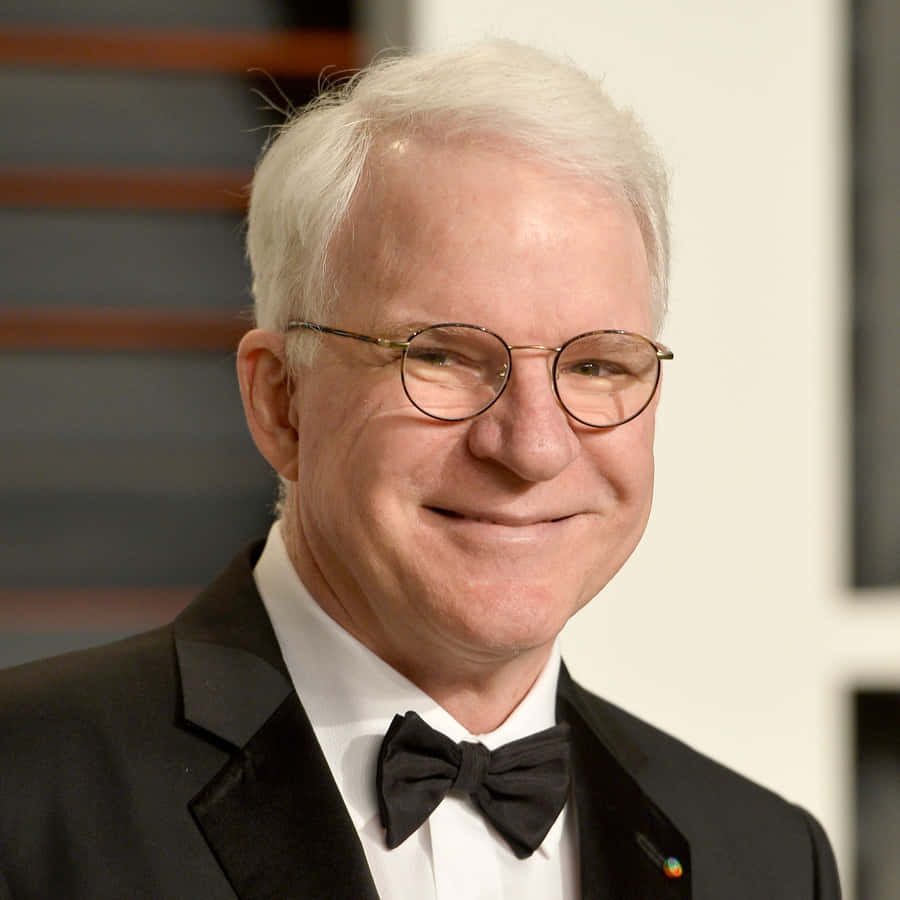 Legendary Comedian Steve Martin Posing For A Portrait Wallpaper