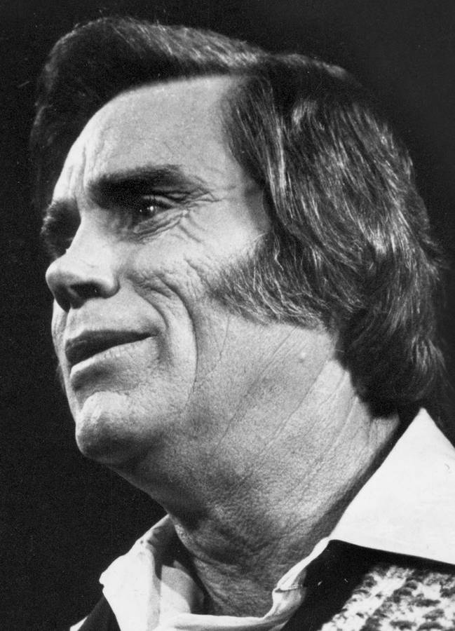 Legendary Country Singer George Jones In Black And White Wallpaper