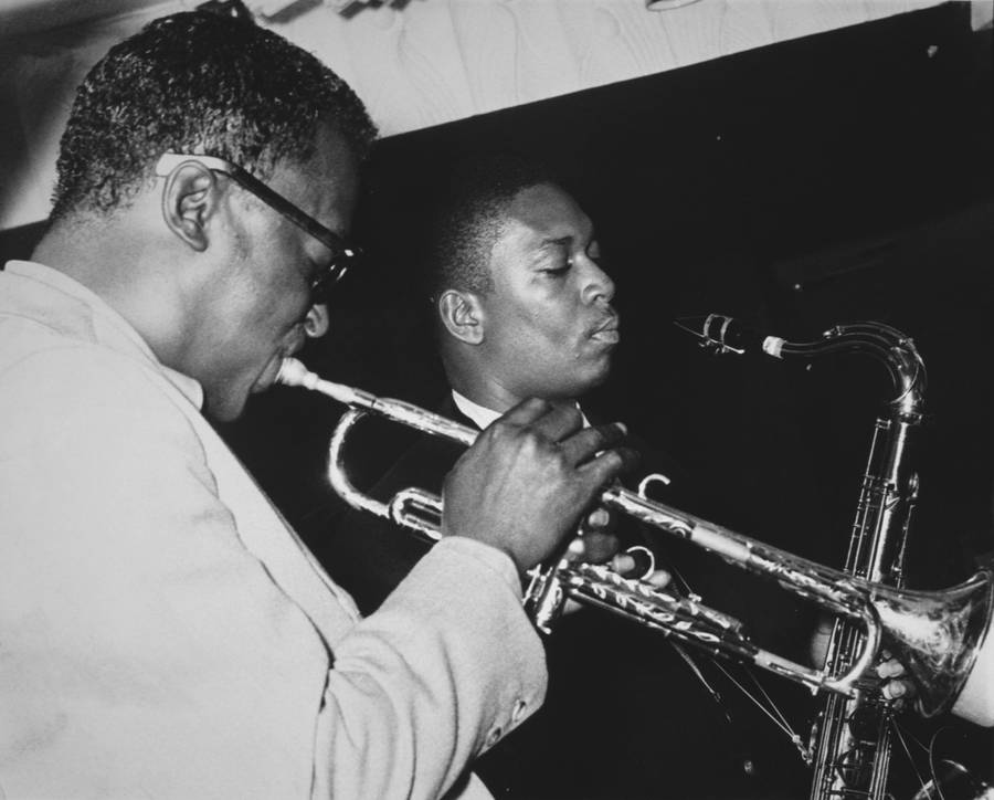 Legendary Jazz Icons - Miles Davis And John Coltrane Wallpaper