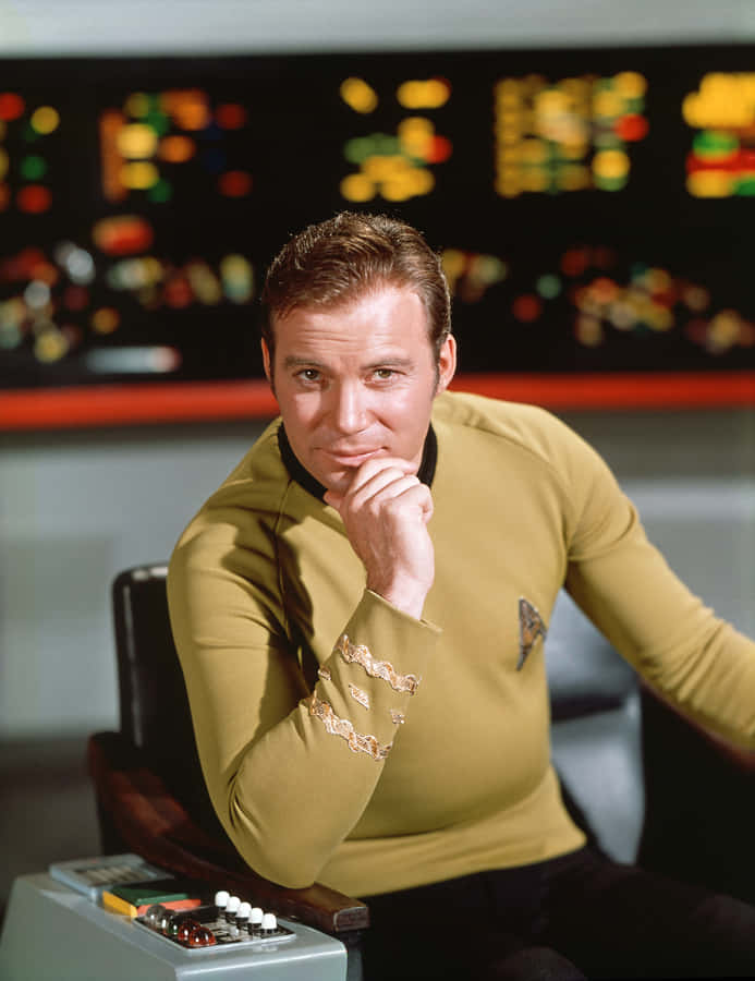 Legendary William Shatner Exuding Sophistication And Timeless Charm Wallpaper