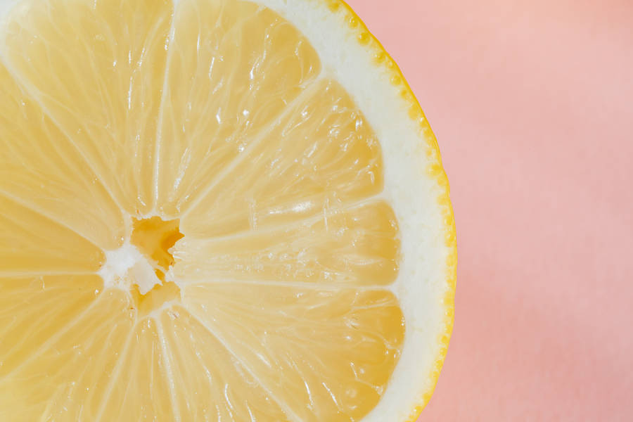 Lemon On Pink Background Wallpaper