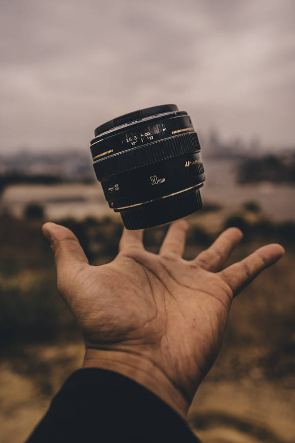 Levitating Photography Lens Wallpaper