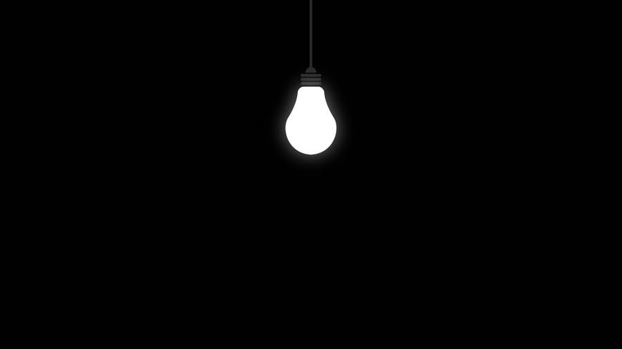 Light Bulb On Black Tablet Wallpaper