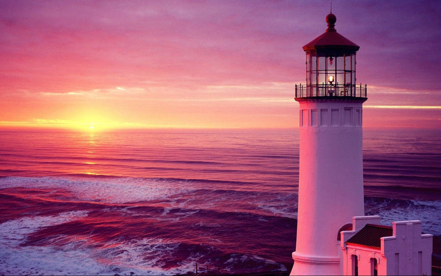 Lighthouse In Pink Sunset Wallpaper