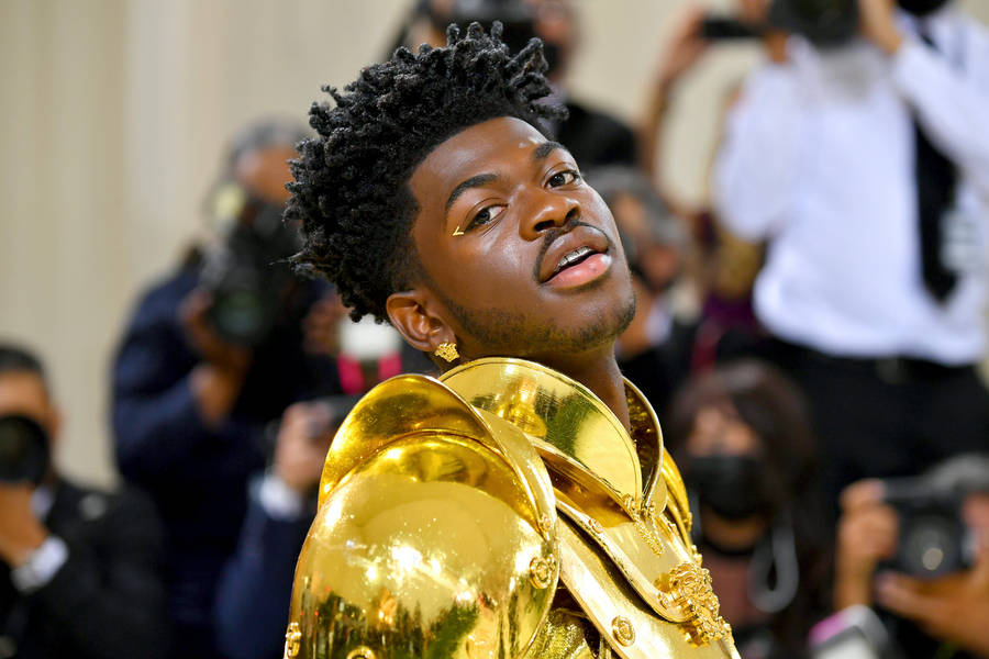 Lil Nas X Gold Armor Outfit Wallpaper