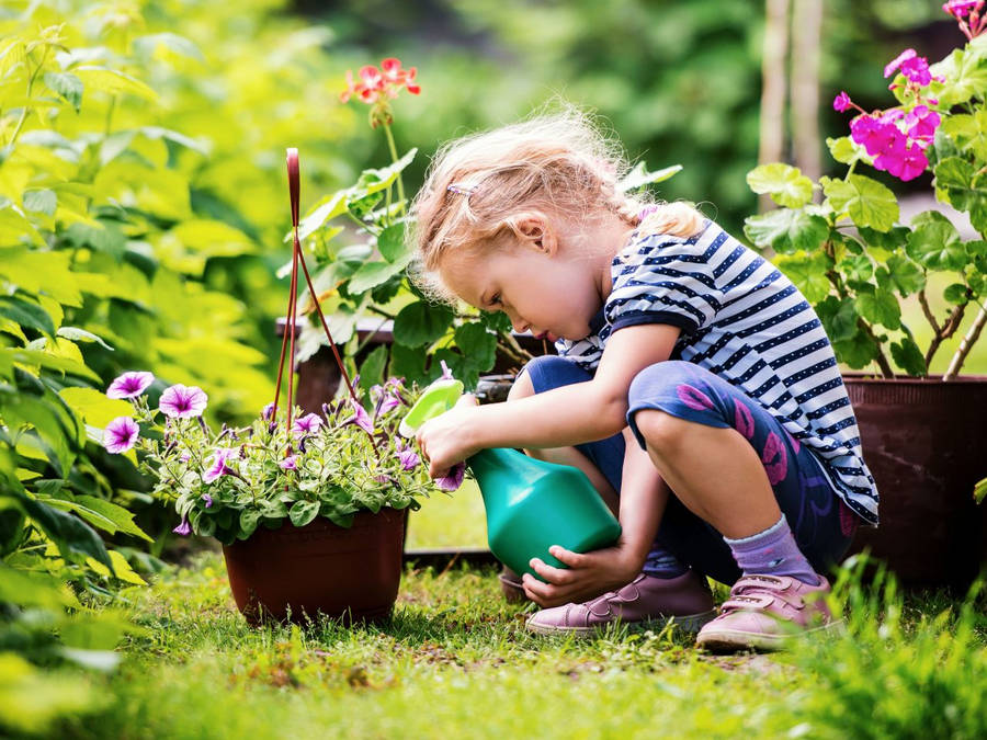 Little Girl Gardening Wallpaper