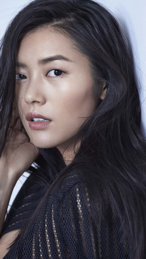 Liu Wen Striking A Pose During A Fashion Shoot. Wallpaper