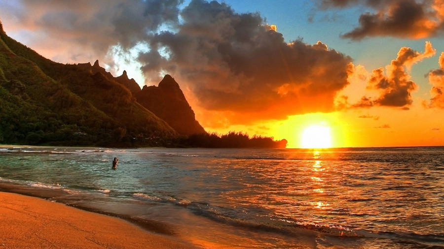 Lone Person On Malibu Beach Wallpaper