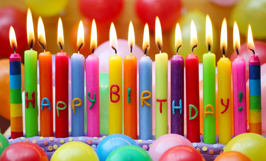 Long Colorful Birthday Cake Candles Wallpaper