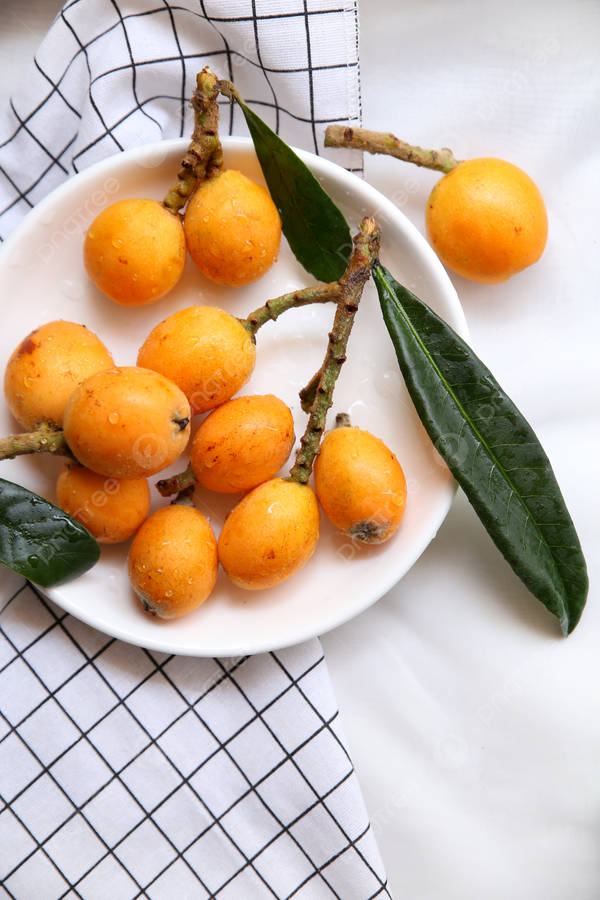 Loquat Fruits On White Plate Wallpaper