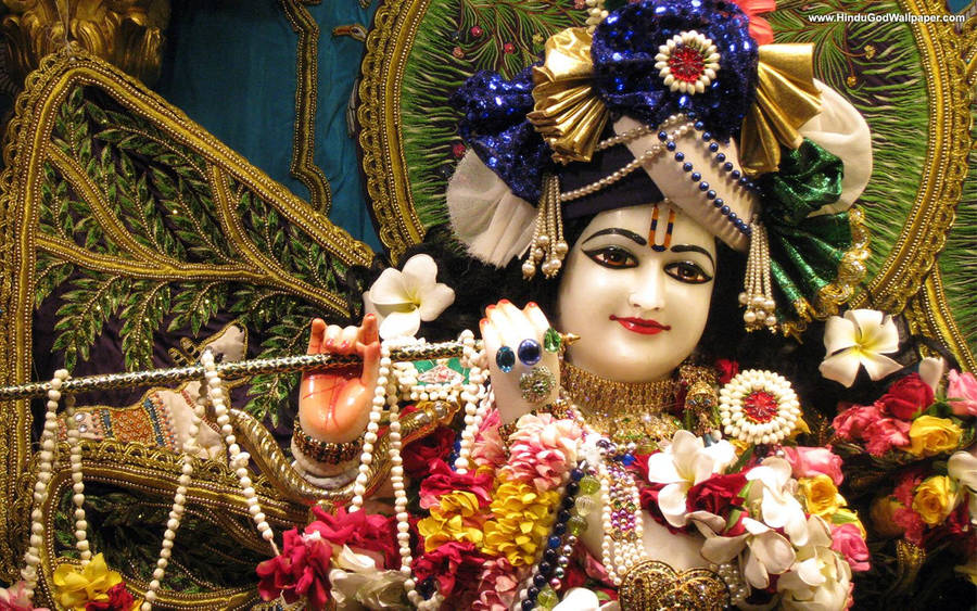 Lord Krishna Depiction In Iskcon Temple Wallpaper