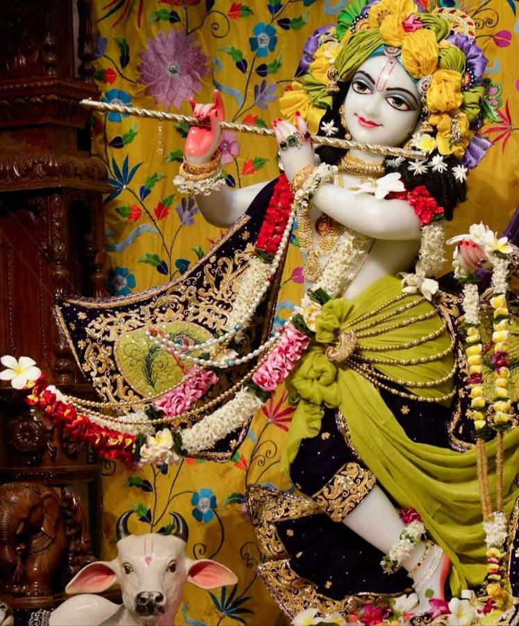 Lord Krishna's Sculpture As An Iskcon Tribute Wallpaper