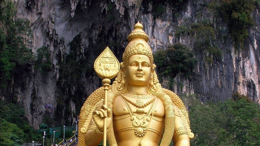 Lord Murugan 4k Statue In Cave Wallpaper