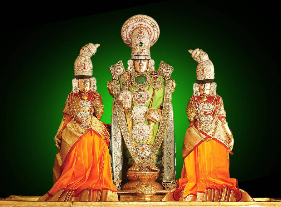 Lord Venkateswara With Two Statues Wallpaper