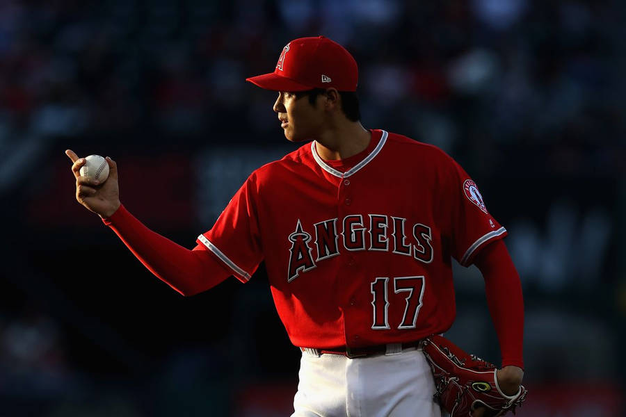 Los Angeles Angels Shohei Ohtani Holding Baseball Wallpaper