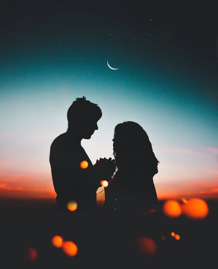 Love Story Under Moonlight Wallpaper