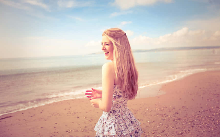 Lovely Blonde Happy Girl On Beach Wallpaper