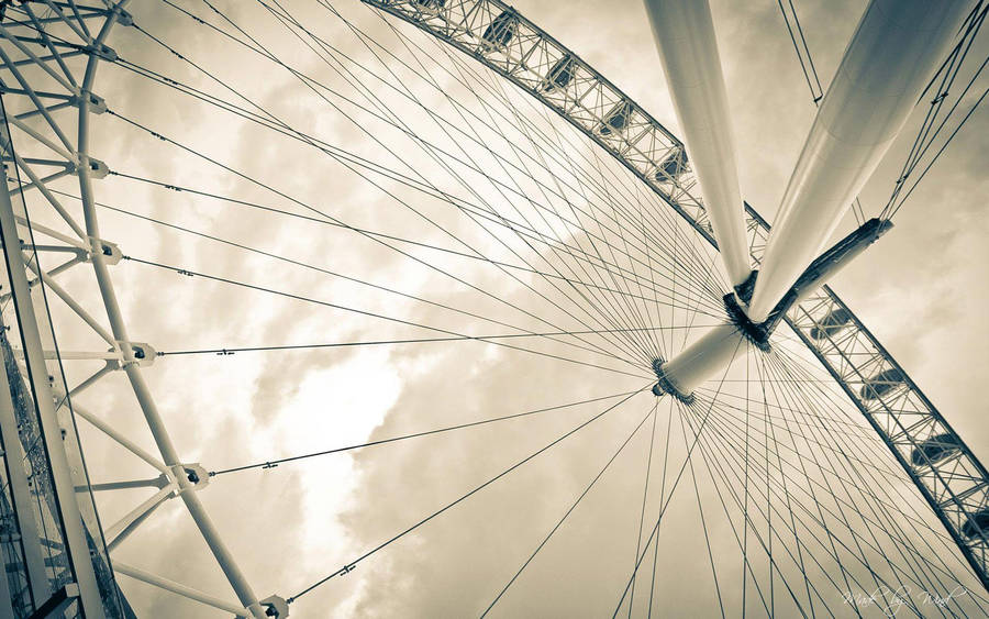 Low Angle Of Ferris Wheel Wallpaper