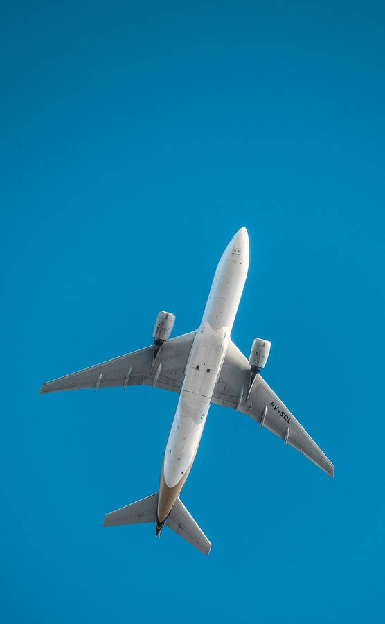 Low Angle Shot Of White Airplane Android Wallpaper