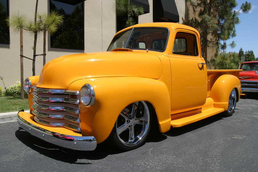 Lowrider Yellow Chevrolet 3100 Pickup Wallpaper