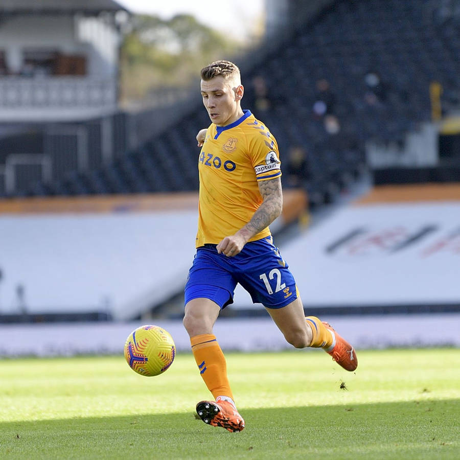 Lucas Digne Chasing Ball Full Body Wallpaper