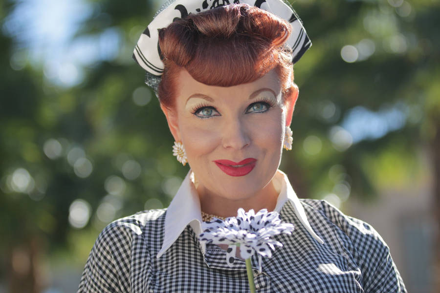 Lucille Ball Holding A Flower Wallpaper