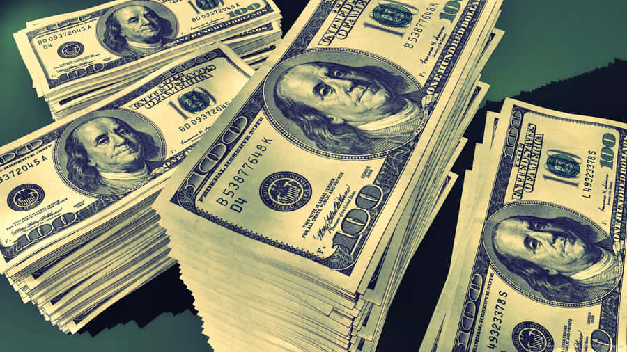 Lucrative Stacks Of Benjamins Against A Green Backdrop Wallpaper