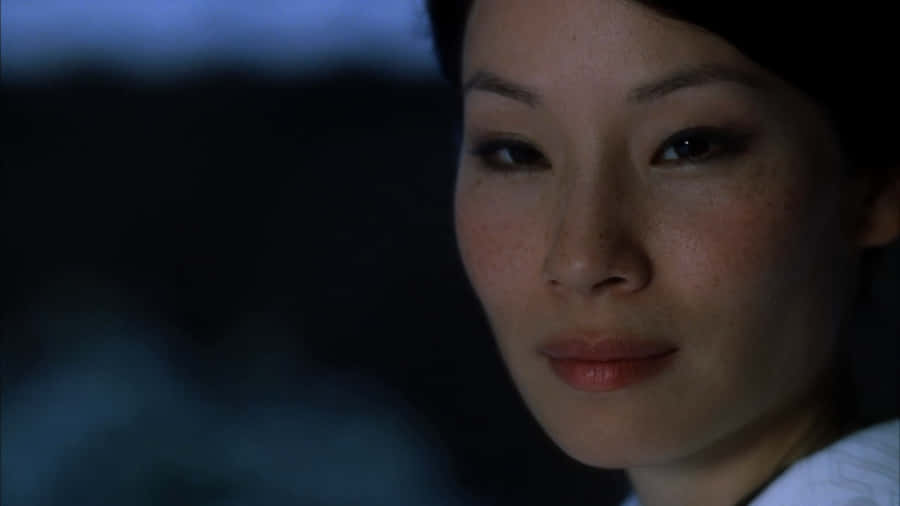 Lucy Liu Poses For A Closeup Photograph Wallpaper