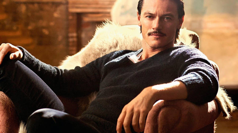 Luke Evans Gray Sweater Wallpaper