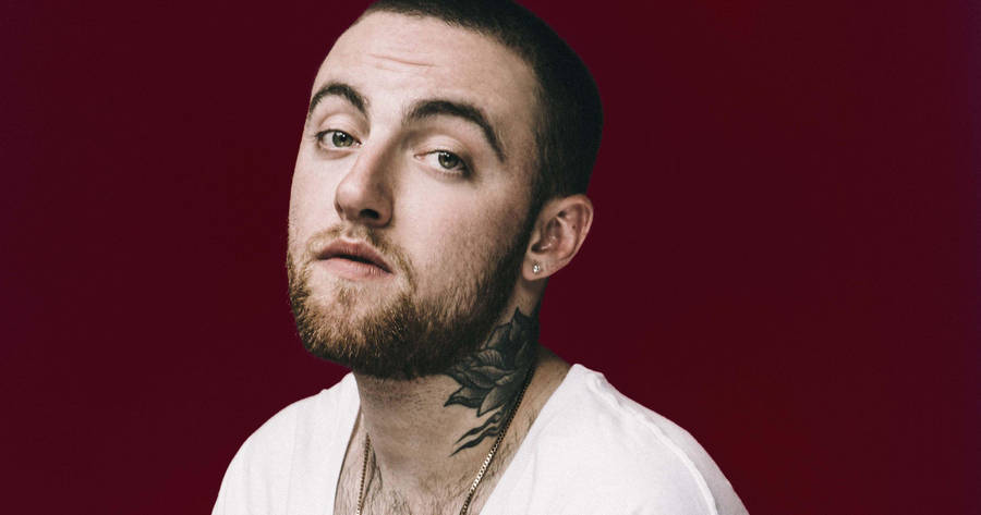 Mac Miller On Maroon Background Wallpaper