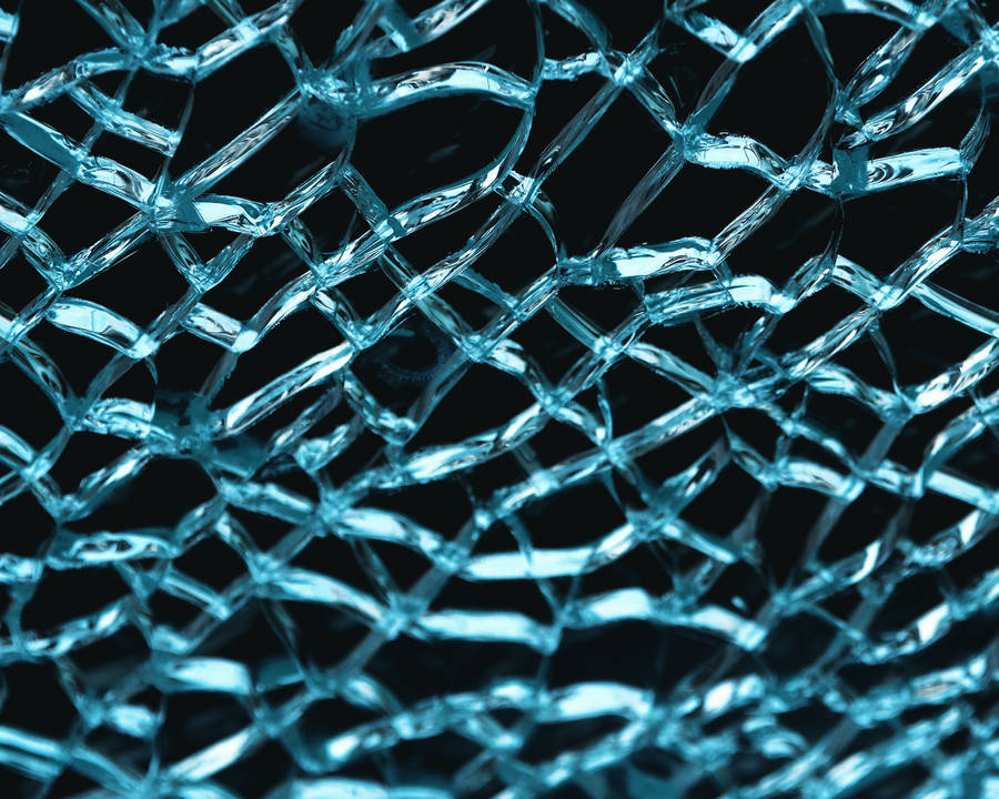 Macro Shot Of Broken Glass Wallpaper