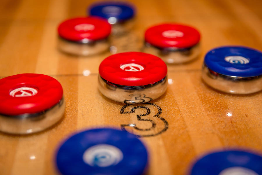 Macro Shot Red Puck Shuffleboard Wallpaper