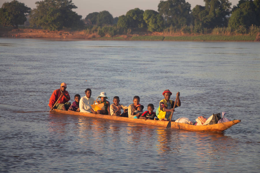 Madagascar People Riding Kayak Wallpaper
