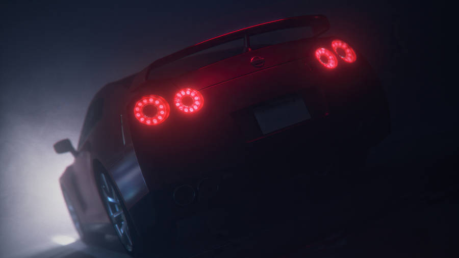 Magnificent Nissan Gt-r In Mystical Fog Wallpaper