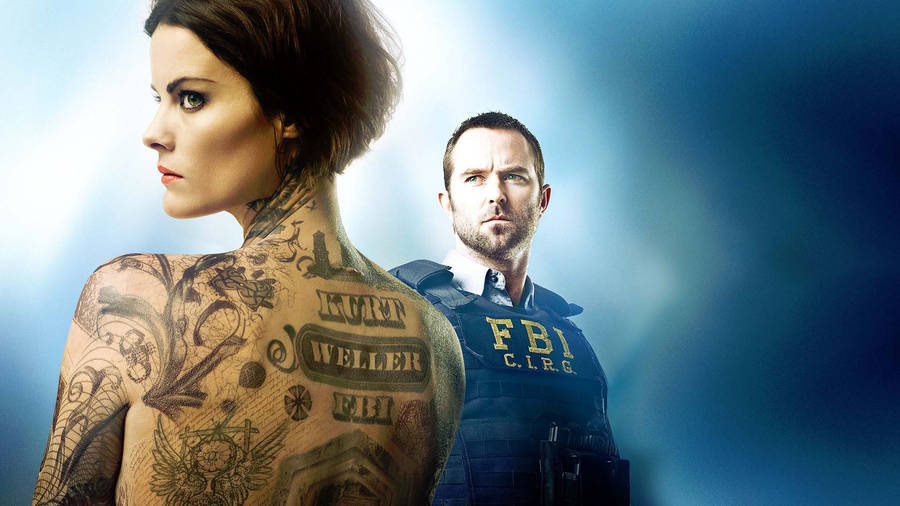 Main Cast Of Blindspot - Jaimie Alexander And Sullivan Stapleton Wallpaper