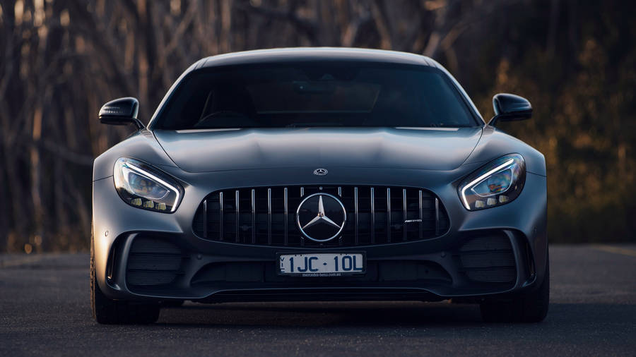 Majestic Black Amg Gt R Glowing Under The City Lights Wallpaper