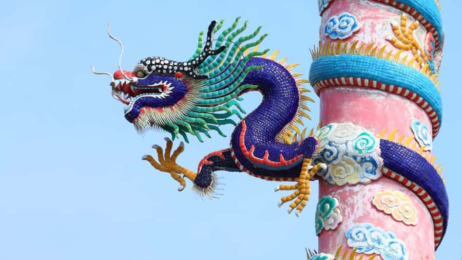 Majestic Blue Dragon Perched On A Cliff Wallpaper